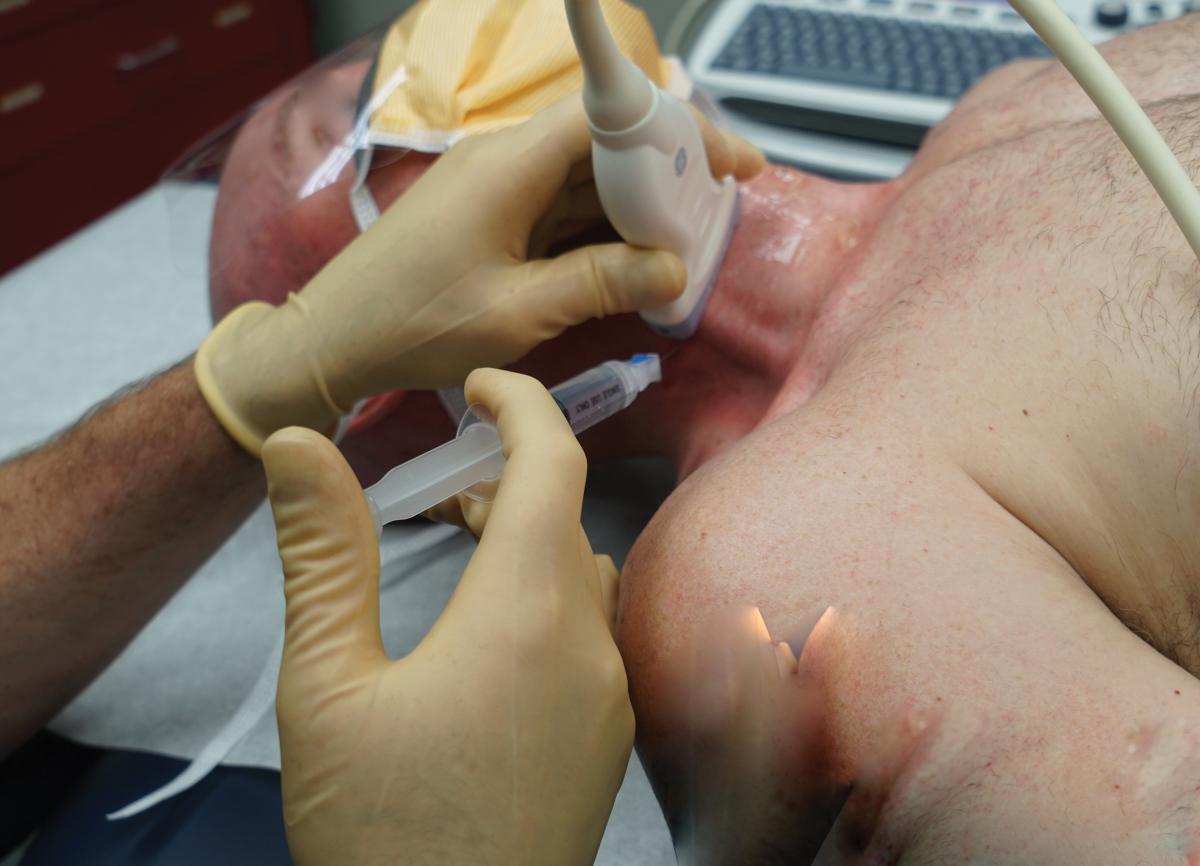 Stellate Ganglion Block procedure being performed on a patient