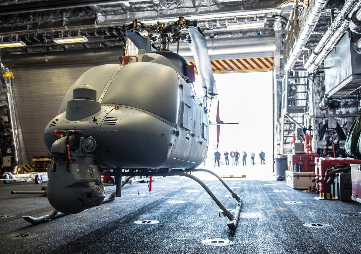  MQ-8C Fire Scout helicopter sits in the hangar bay of the littoral combat ship USS Montgomery (LCS-8)