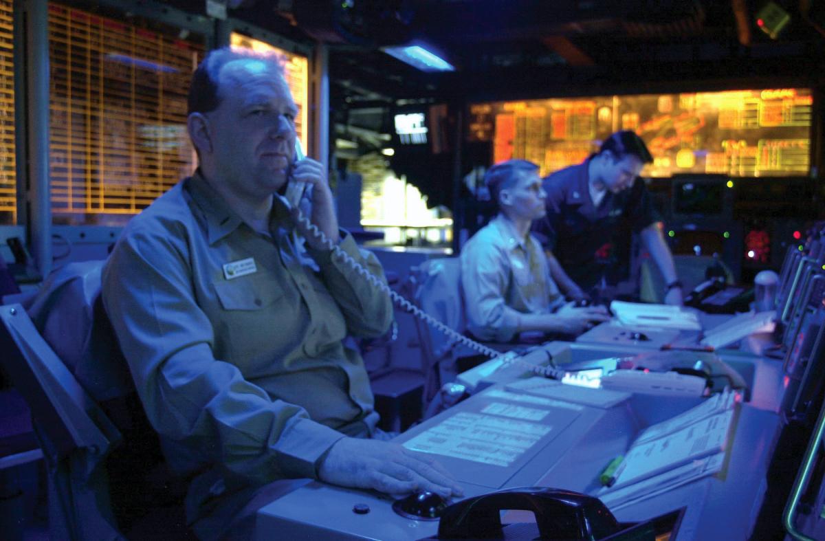 A TOPGUN-trained AIC on board the USS Kitty Hawk (CV-63) in 2003
