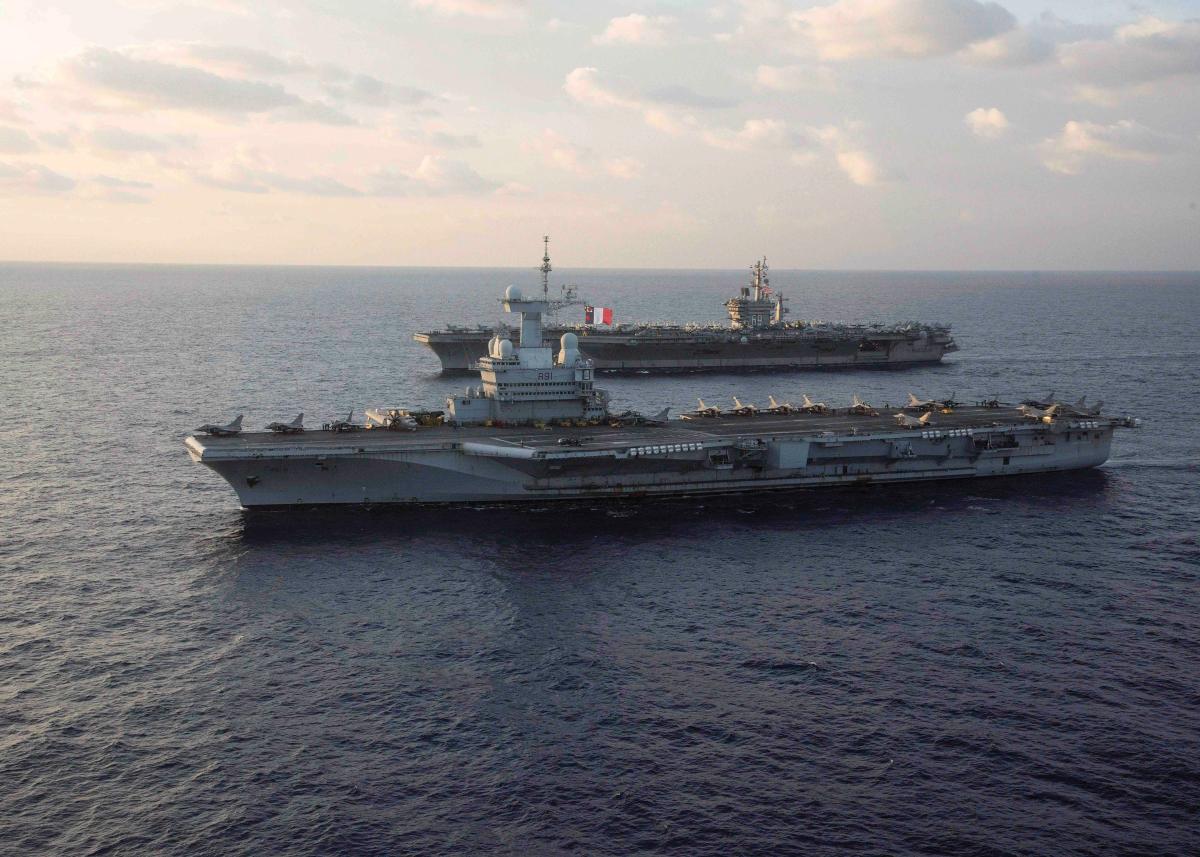 Aircraft carrier USS Dwight D. Eisenhower (CVN-69 )transiting the Mediterranean Sea alongside aircraft carrier FS Charles de Gaulle (R91).