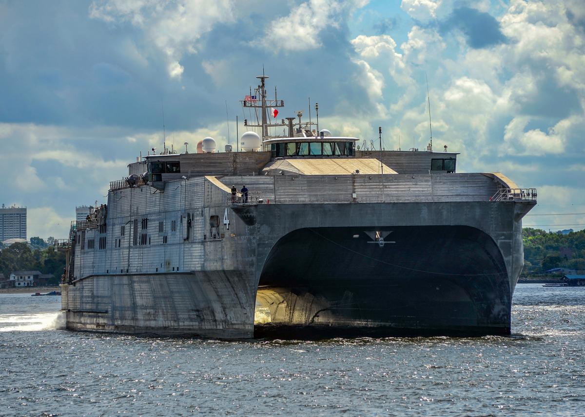 The Military Sealift Command fast expeditionary transport ship USNS Fall River (T-EPF-4) pulls into the Sembawang Wharves in Singapore