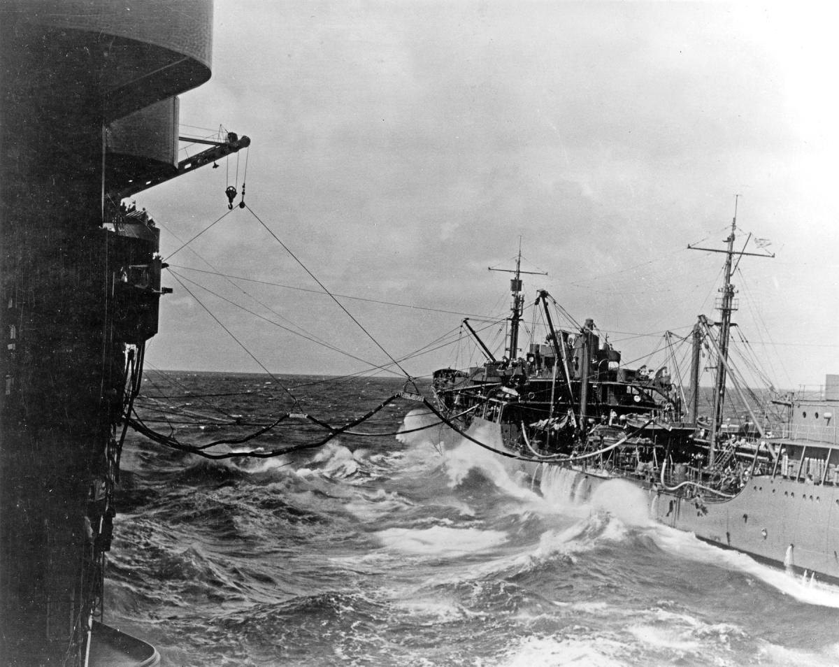 USS Neosho performing underway replenishment of the carrier USS Yorktown (CV-5) at sea on 1 May 1942