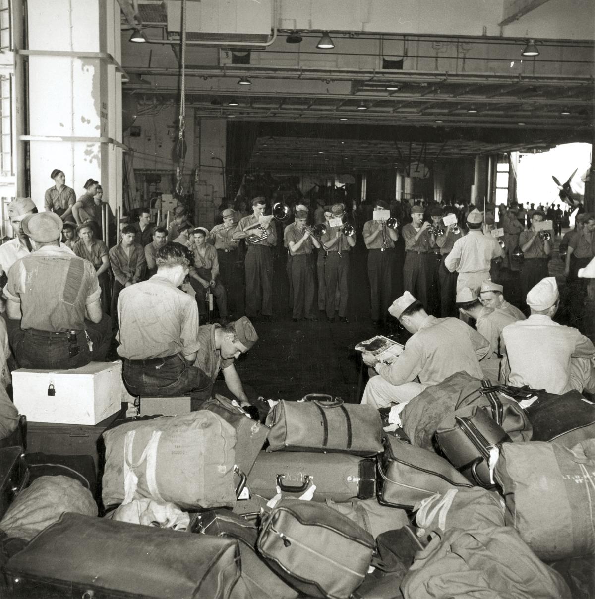 Members of Air Group 11 aboard the USS Hornet (CV-12)