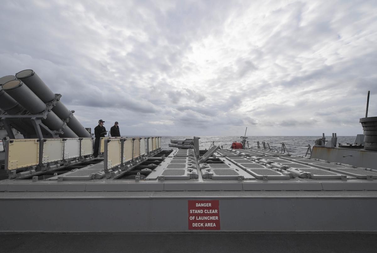 Sailors conduct maintenance on the aft vertical launching system aboard the guided missile destroyer USS Porter (DDG-78)