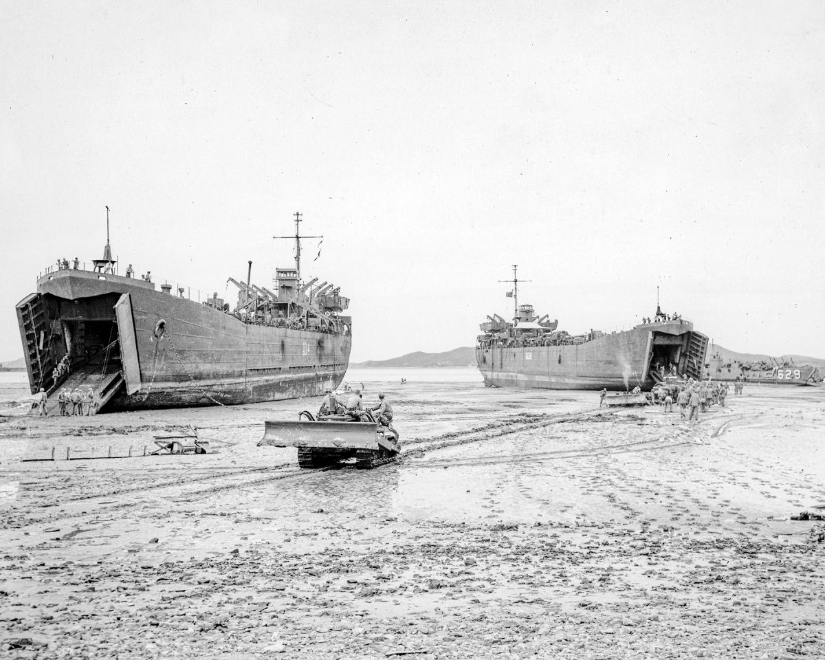 LSTs at low tide on Wolmi Island in 1950