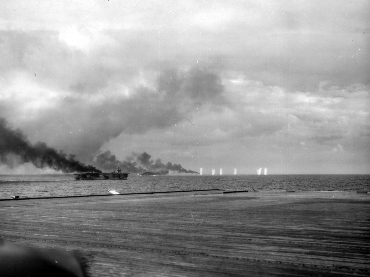 Escort carrier under attack by the Japanese fleet during the Battle off Samar