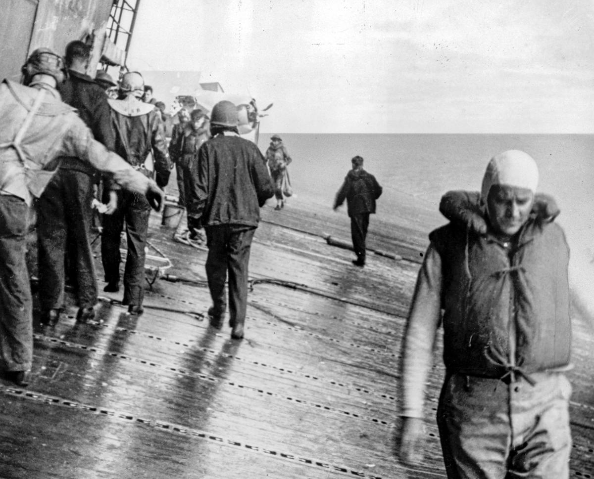 View of the deck of the USS Yorktown listing following Japanese attacks at the Battle of Midway