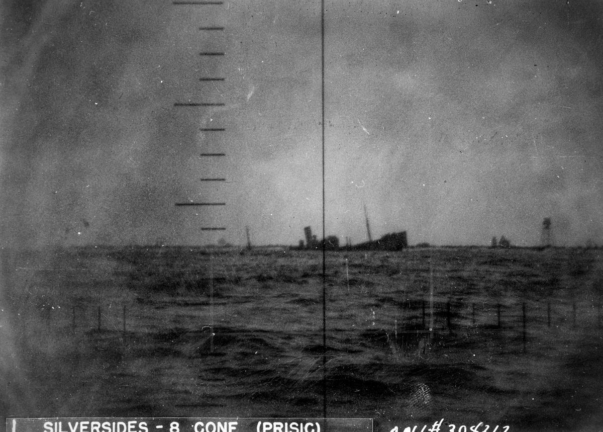 Periscope view from the USS SIlversides (SS-236) of a Japanese ship sinking.