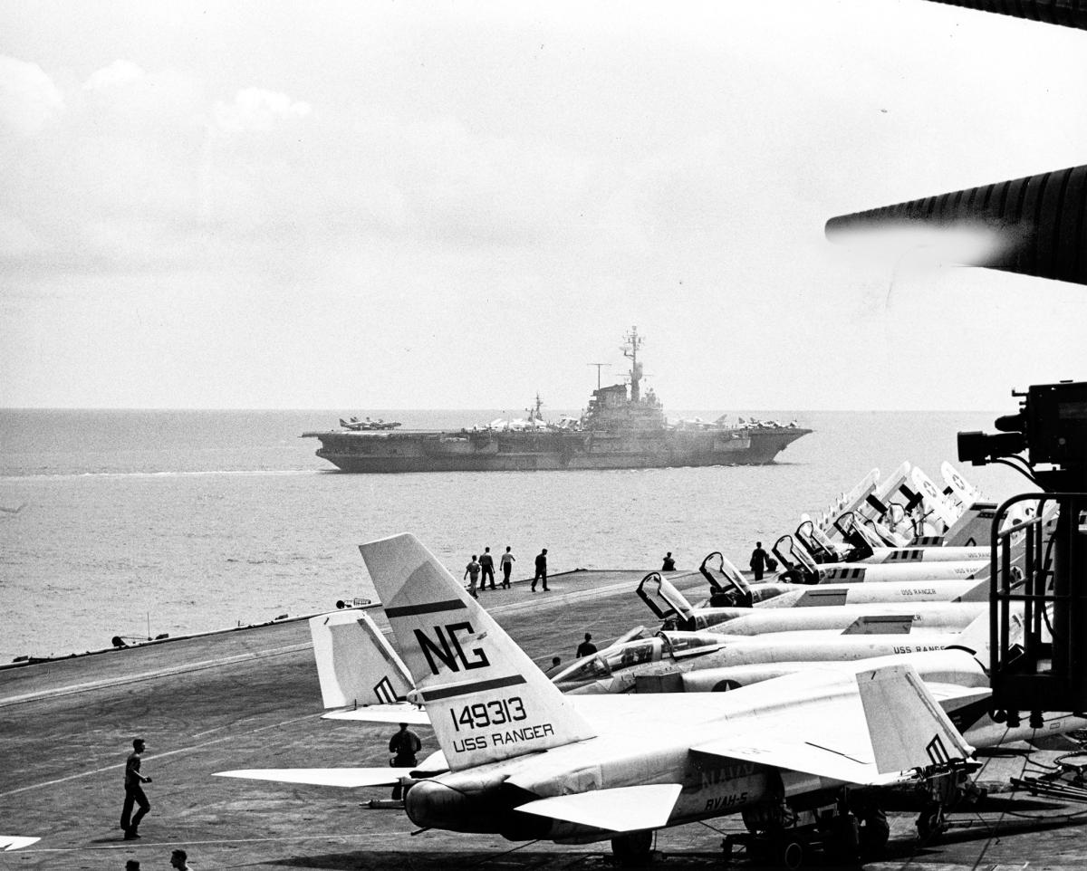 USS Coral Sea (CVA-43) viewed from USS Ranger (CVA-61) with aircraft on deck