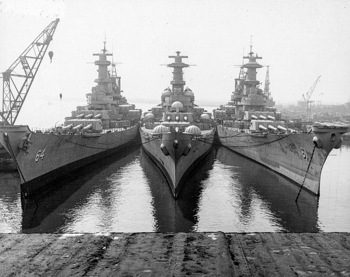Bow-on view of three Iowa-class battleships in reserve