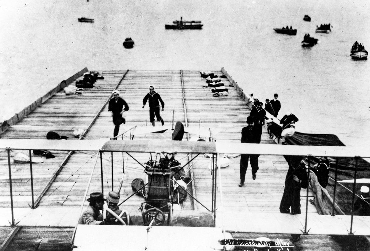Eugene B. Ely immediately after landing his Curtiss Pusher on USS Pennsylvania (ACR-4)