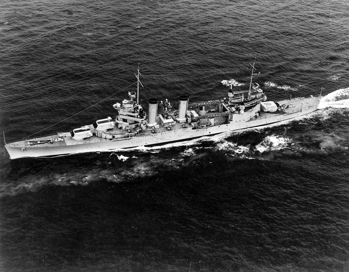 Aerial view of USS Quincy (CA-39) underway at sea.