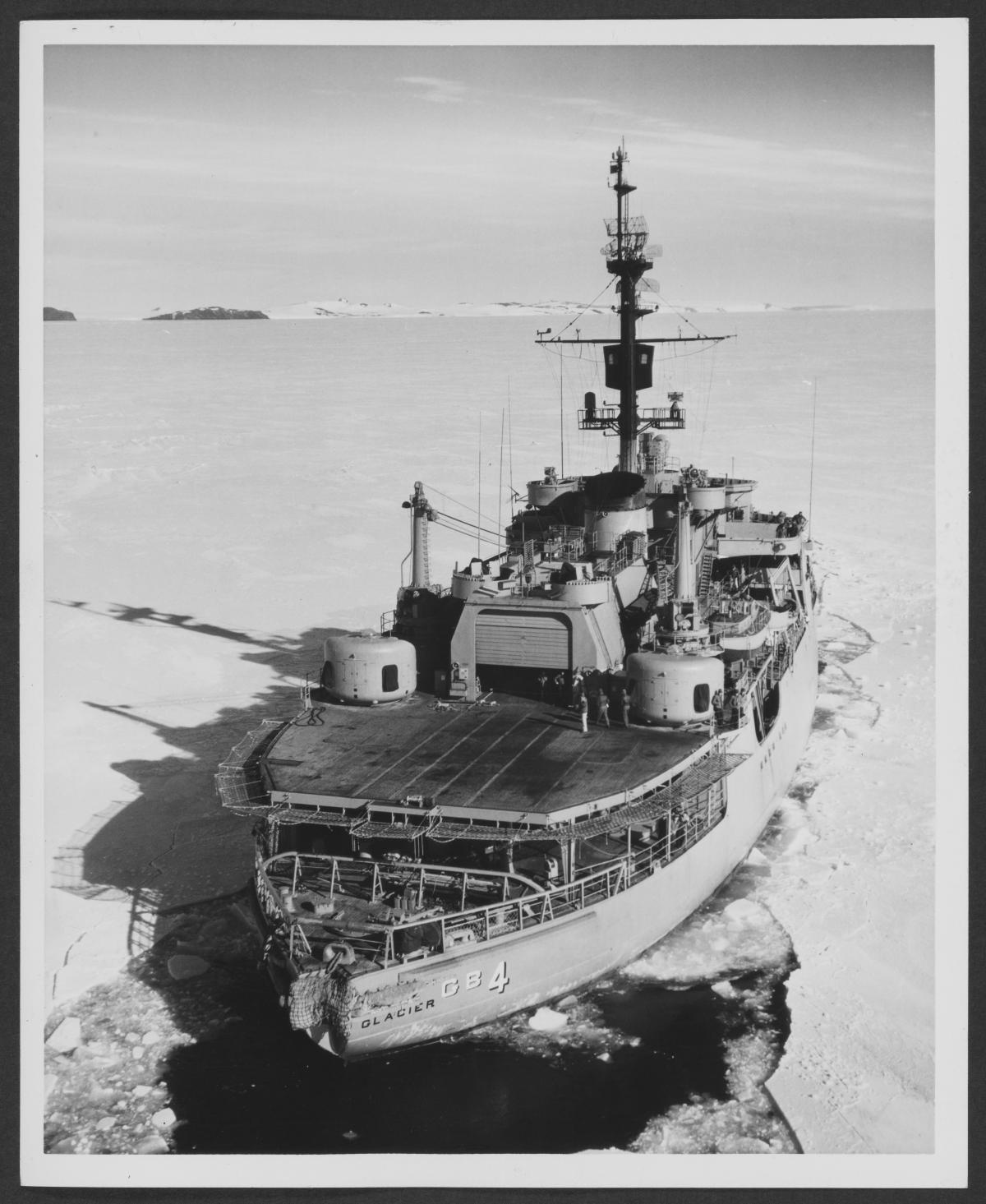 The USS Glacier (ABG-4) breaking ice out of McMurdo Sound en route to Hut Point.