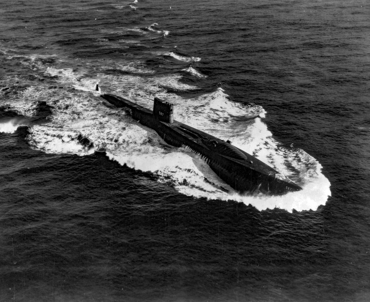 Aerial oblique starboard bow view of the USS Halibut (SSN-587) underway