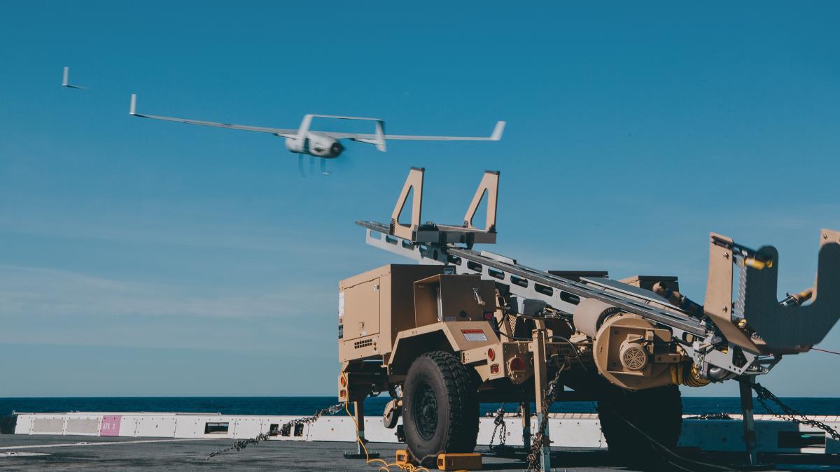 An RQ-21A Unmanned Aerial System launches from the flight deck of USS John P. Murtha (LPD-26). 