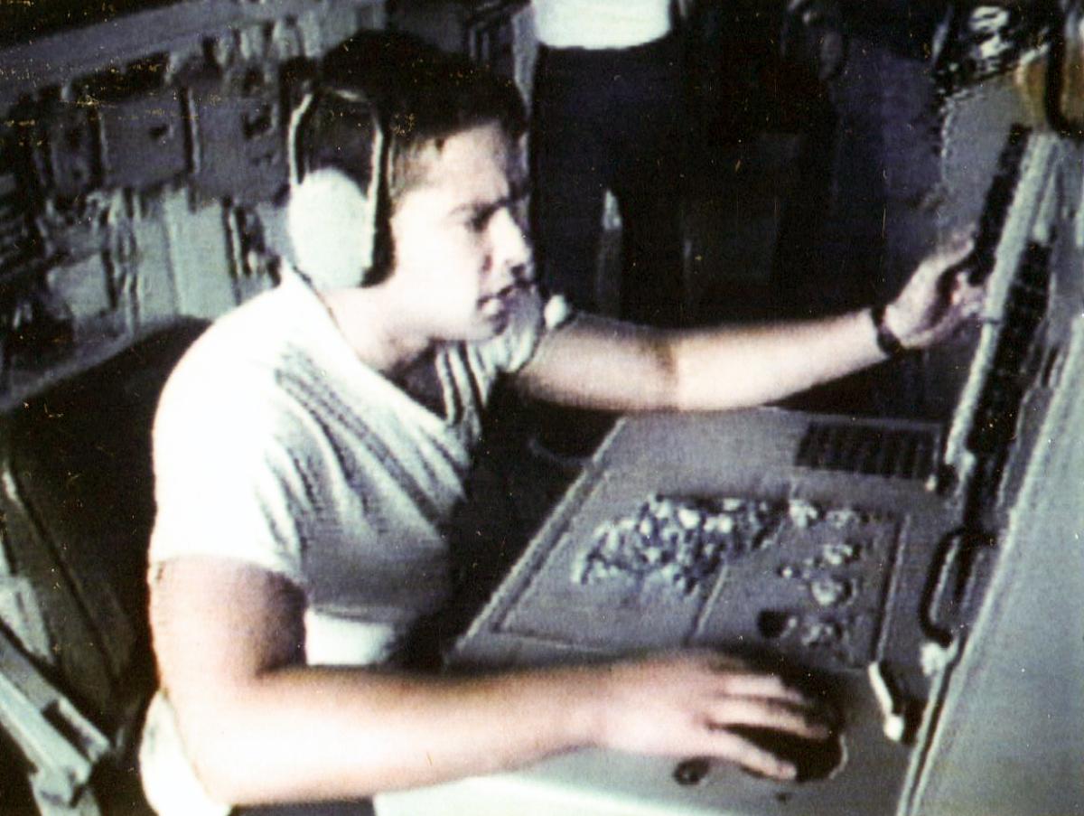 Ops specialist on USS Vincennes (CG-49) monitoring surface contacts.