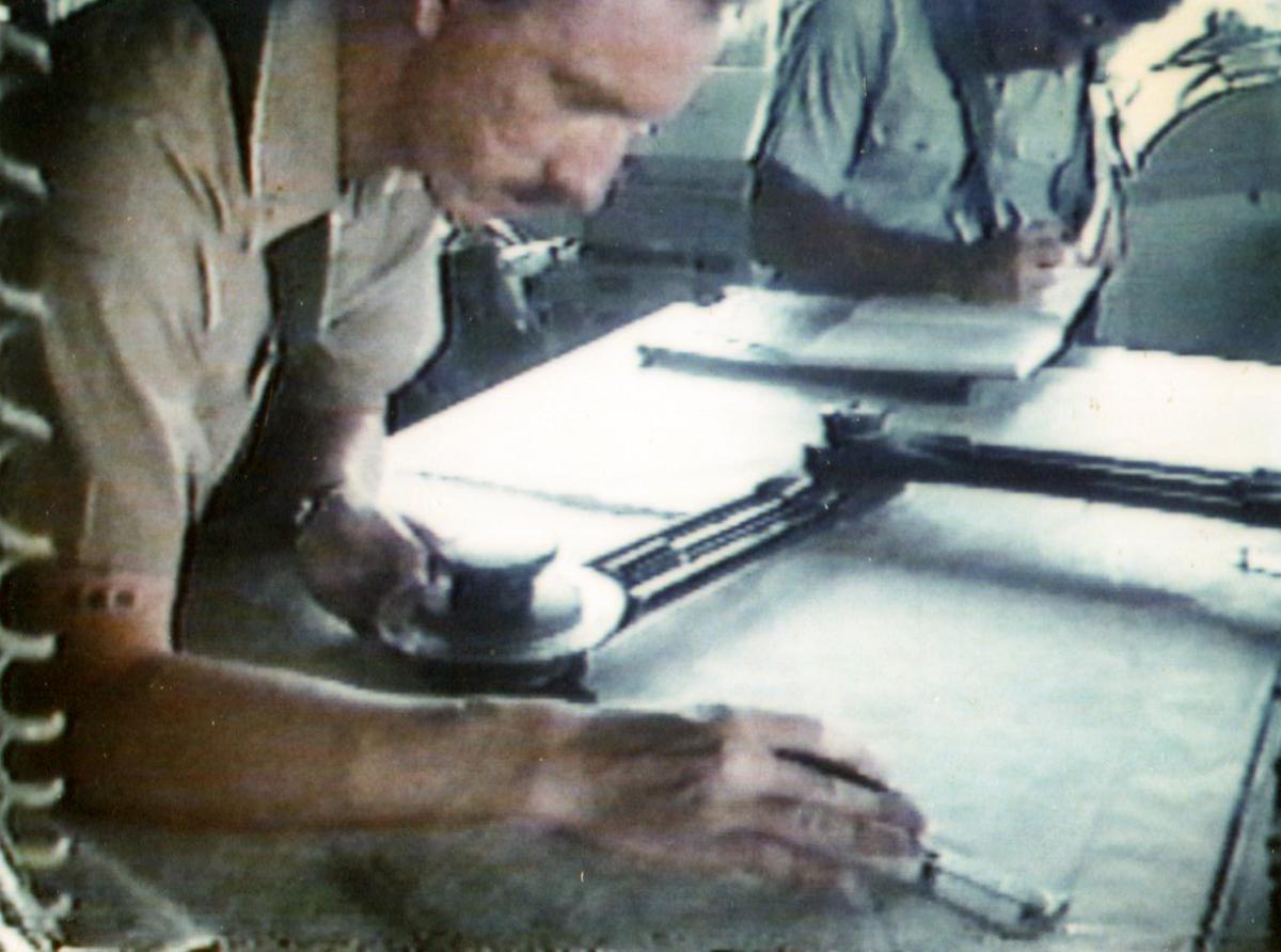 USS Vincennes' navigator keeping ship's track.