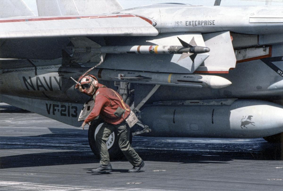 An F-14 Tomcat prepares to launch as part of the initial attack during Operation Praying Mantis