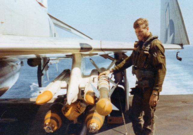 Before a late 1971 bombing mission over North Vietnam, Dosé inspects his Phantom’s ordnance. His hand rests on a heat-seeking AIM-9 Sidewinder missile, which U.S. pilots came to rely on during dogfights with MiGs. 
