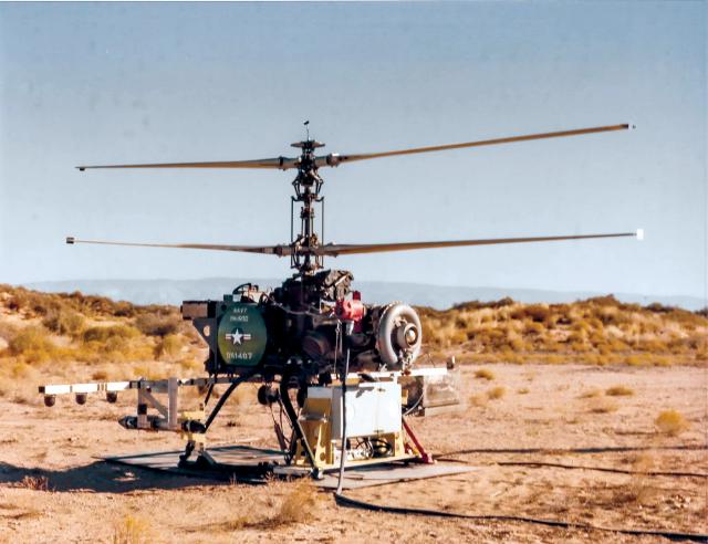 This Gyrodyne QH-50 DASH was employed as a target in the SIAM tests. Note the flare dispensers on the metal rack projecting left and right of the airframe. Originally designated DSN-1, DASH was developed to deliver an antisubmarine torpedo or nuclear depth charge against submarines detected by shipboard sonars. These unmanned helicopters also were employed for gunfire spotting and as target drones. 