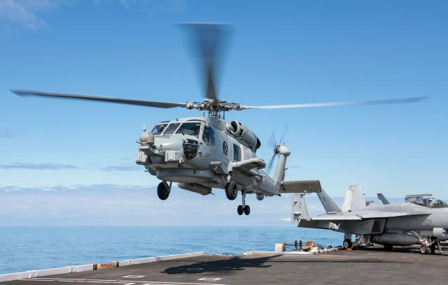 MH-60R helicopters, such as this aircraft from the “Bluehawks” of Helicopter Maritime Strike Squadron 78, are the only organic antisubmarine warfare assets in carrier air wings today. The Navy will take delivery of its final MH-60Rs this year. 