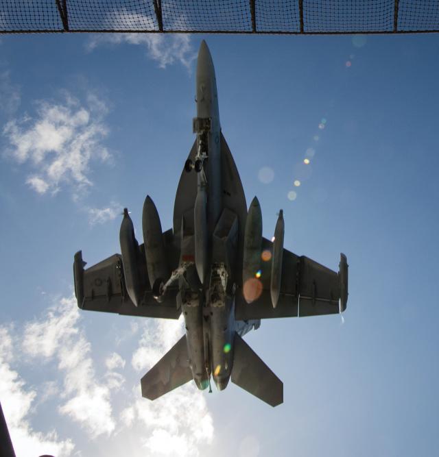 An EA-18G Growler from Air Test and Evaluation Squadron 23 approaches the flight deck of the USS Gerald R. Ford (CVN-78) during aircraft compatibility testing in January 2020. The Growler will carry the AN/ALQ-247 Next Generation Jammer pod. 