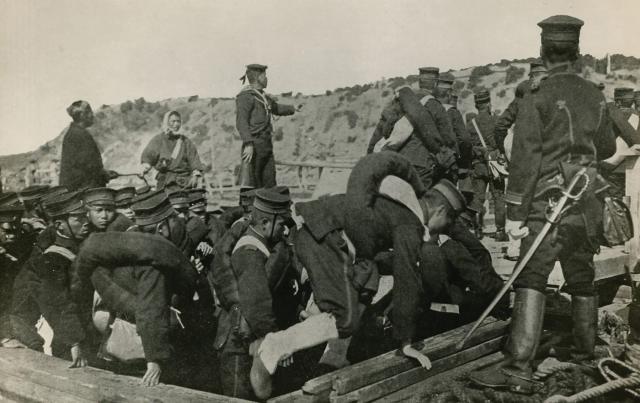 A transport craft lands the Japanese First Army ashore in Korea to challenge a dismissive Russian Empire during the 1904–05 Russo-Japanese War—a war that serves as “a perfect example of a beguiling mindset that must be avoided: overconfidence.”