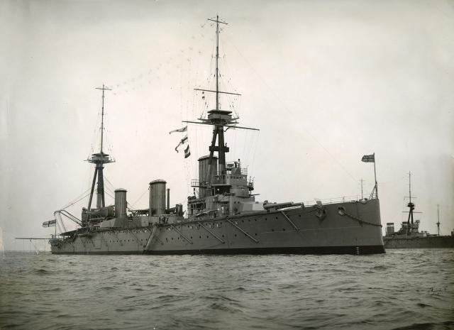 HMS Indefatigable, lead ship of her battlecruiser class, would meet her watery fate at the 1916 Battle of Jutland. While this capstone showdown of the pre–World War I naval arms race failed to deliver a knockout blow for either side, “the British had preserved the critical blockade of the German fleet.”