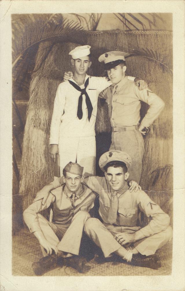 Malcolm (upper left) and Gordon (lower right) Shive pictured ashore with a Marine and an Army pal.