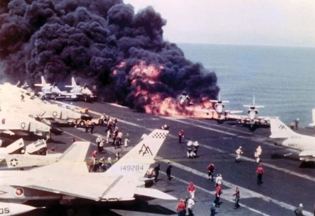Lieutenant Commander John McCain’s A-4 Skyhawk is surrounded by fire
