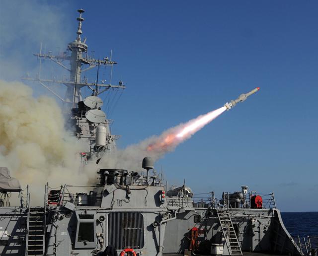 The USS Mitscher (DDG-57) launches a Harpoon antiship missile 