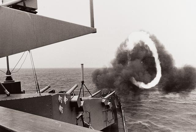 A smoke ring formed by a two-gun salvo