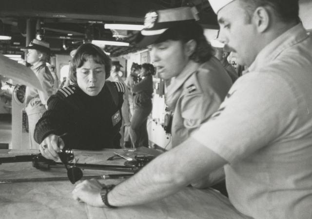 Commander Deborah S. Gernes (left), Lieutenant Kathleen A. McGrath, ship’s navigator, and Quartermaster First Class Wendell W. Dev