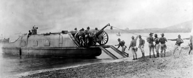 landing craft emerging from the water during the early 20th-century Culebra maneuvers