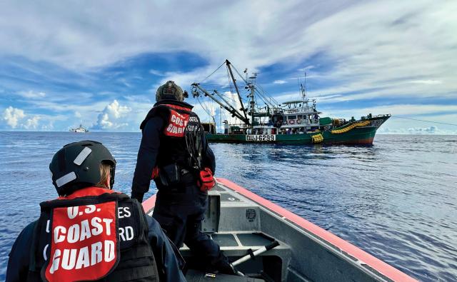 Crew from the Oliver Henry (WPC-1140) approach a fishing vessel during a patrol supporting the Pacific Islands Forum Fisheries Agency’s efforts to stop illegal, unreported, and unregulated fishing.