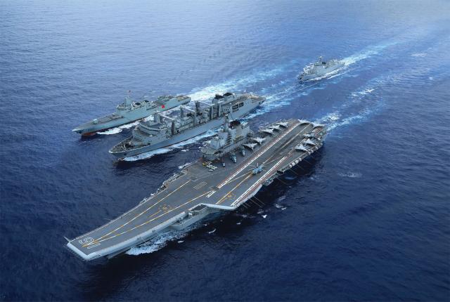 The Chinese aircraft carrier Liaoning and escorts at sea. 