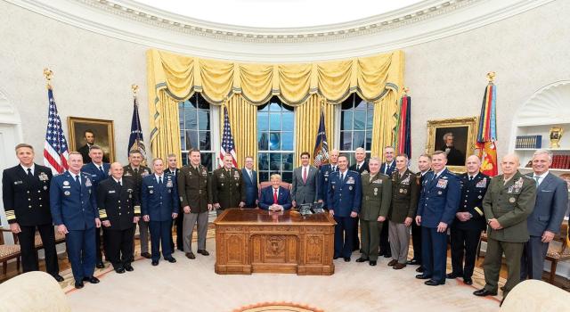 Power has a race in the U.S. military and it is overwhelmingly white, as this October 2019 picture of military service chiefs, combatant commanders, and senior Defense Department civilians assembled in the Oval Office shows. 