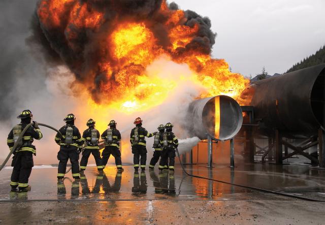 Firefighters train at the Washington State Fire Academy near North Bend, Washington. First responders often face stressful, dangerous situations in their jobs—much like members of the Sea Services. The Coast Guard should consider how other similar communities build cultures of resilience among their members. 