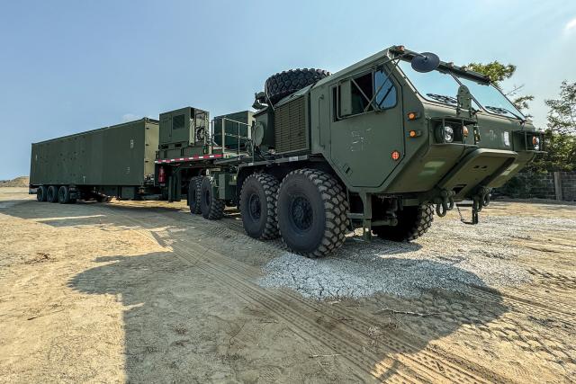 A Typhon Mid-Range Capability launcher from the 3rd Field Artillery Regiment (Long Range Fires Battalion) arrives in Northern Luzon, Philippines, on 8 April 2024. Enhancing maritime defense capabilities and bolstering U.S.-Philippine interoperability and readiness of the alliance are key aspects of a strategy to deter Chinese territorial encroachment. 