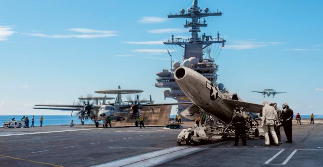 A Regulus I and its launch cart, as imagined in this composite, on the deck of the aircraft carrier USS George H. W. Bush (CVN-77).