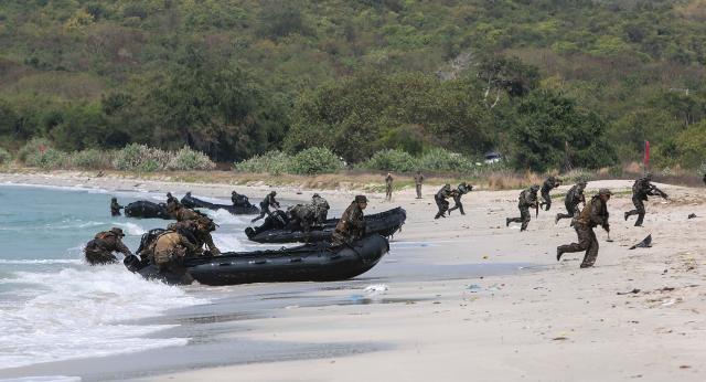 Marines disembark from Zodiac boats during Exercise Cobra Gold. Permanent small boat companies within infantry units would get Marines ashore faster and give them the means to maneuver on inland waterways once there.