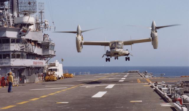 A Bell XV-15 hovering over an aircraft carrier