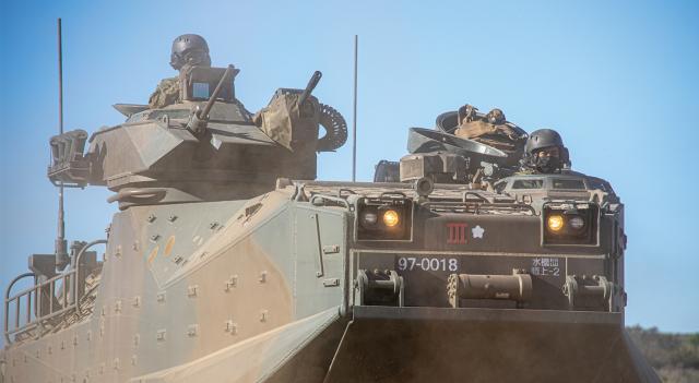 An AAV-7 Assault Amphibious Vehicle from the JGSDF 2nd Amphibious Rapid Deployment Regiment prepares for a training exercise. These vehicles are useful in operations that might involve recapturing remote islands, but moving them can reduce the rapidity of a response to a sudden crisis.