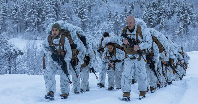 U.S. Marines with Combat Logistics Battalion 2, Combat Logistics Regiment 2, 2nd Marine Logistics Group, conduct a three-mile hike during Marine Rotational Force-Europe 23.1 in Setermoen, Norway, in January 2023. The Marine Corps must design a force that can generate both fires and maneuver to succeed in any operating environment.