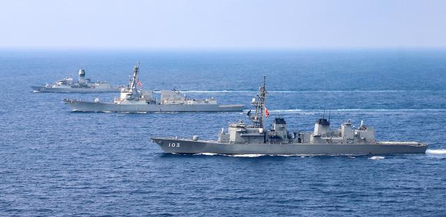 Japan Maritime Self-Defense Force ship Yudachi, the USS Momsen (DDG-92), and the Royal Australian Navy frigate HMAS Arunta 