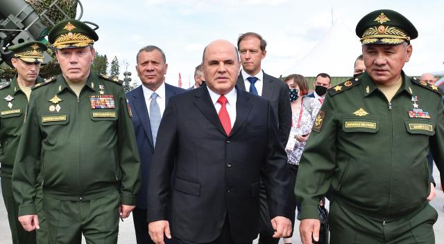 Russian Prime Minister Mikhail Mishustin, Defense Minister Sergei Shoigu, and Chief of the General Staff Valery Gerasimov tour an arms exhibition in August 2020. Basic Principles of State Policy of the Russian Federation on Nuclear Deterrence outlines the conditions under which these men and President Vladimir Putin would decide whether to use  nuclear weapons. 