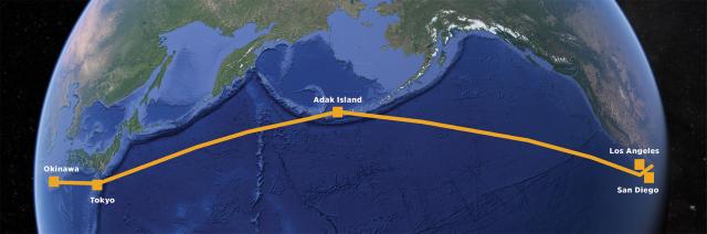 A great-circle route across the Pacific Ocean from San Diego to Okinawa with a stop in Adak