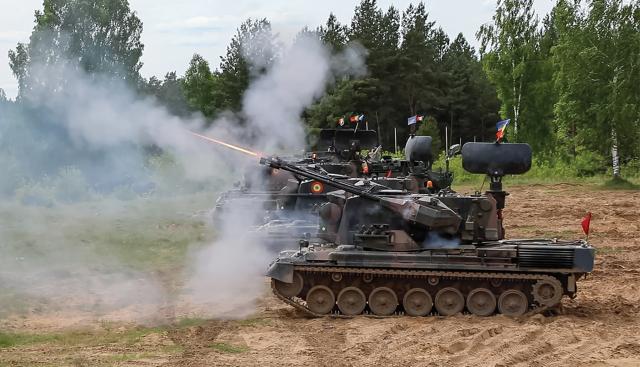 A Romanian Flakpanzer Gepard antiaircraft gun and Russian Lancet loitering munitions (facing page). A swarm of loitering munitions could force antiaircraft weapons into the open for follow-on attack.