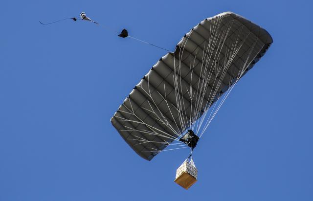 A Joint Precision Autonomous Delivery System (JPADS) belonging to Special Purpose Marine Air-Ground Task Force-Crisis Response—Africa approaches the point of impact in Zaragoza, Spain. 