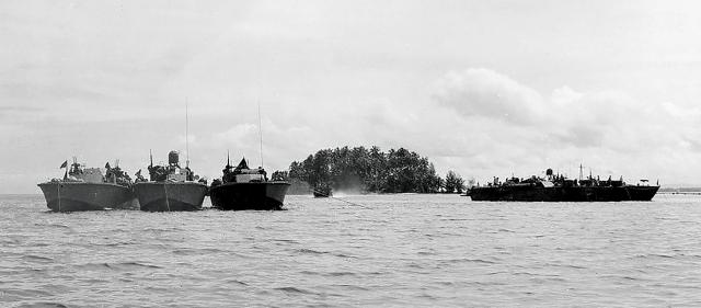 PT boats of Motor Torpedo Squadron Nine are anchored off Lumbari Island, site of Todd City, in June 1943. One of the squadron’s members was the first PT boater to die there—and it was he who lent his name to the base.